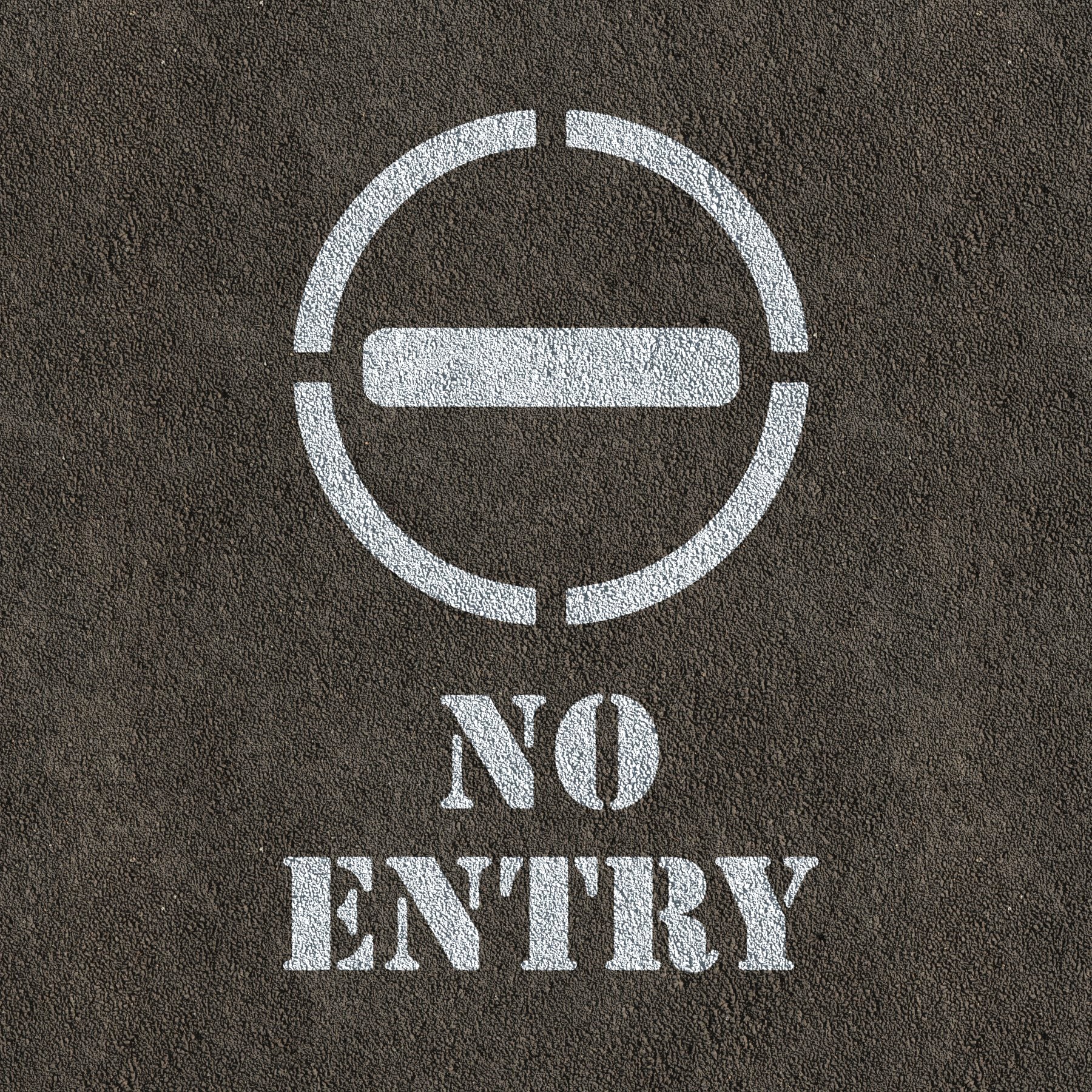 No Entry Symbol and Text Stencil Painted on Road Surface