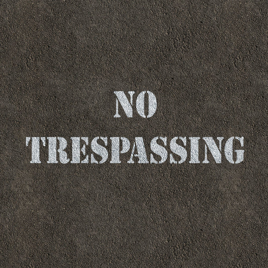 CraftStar No Trespassing stencil painted on road