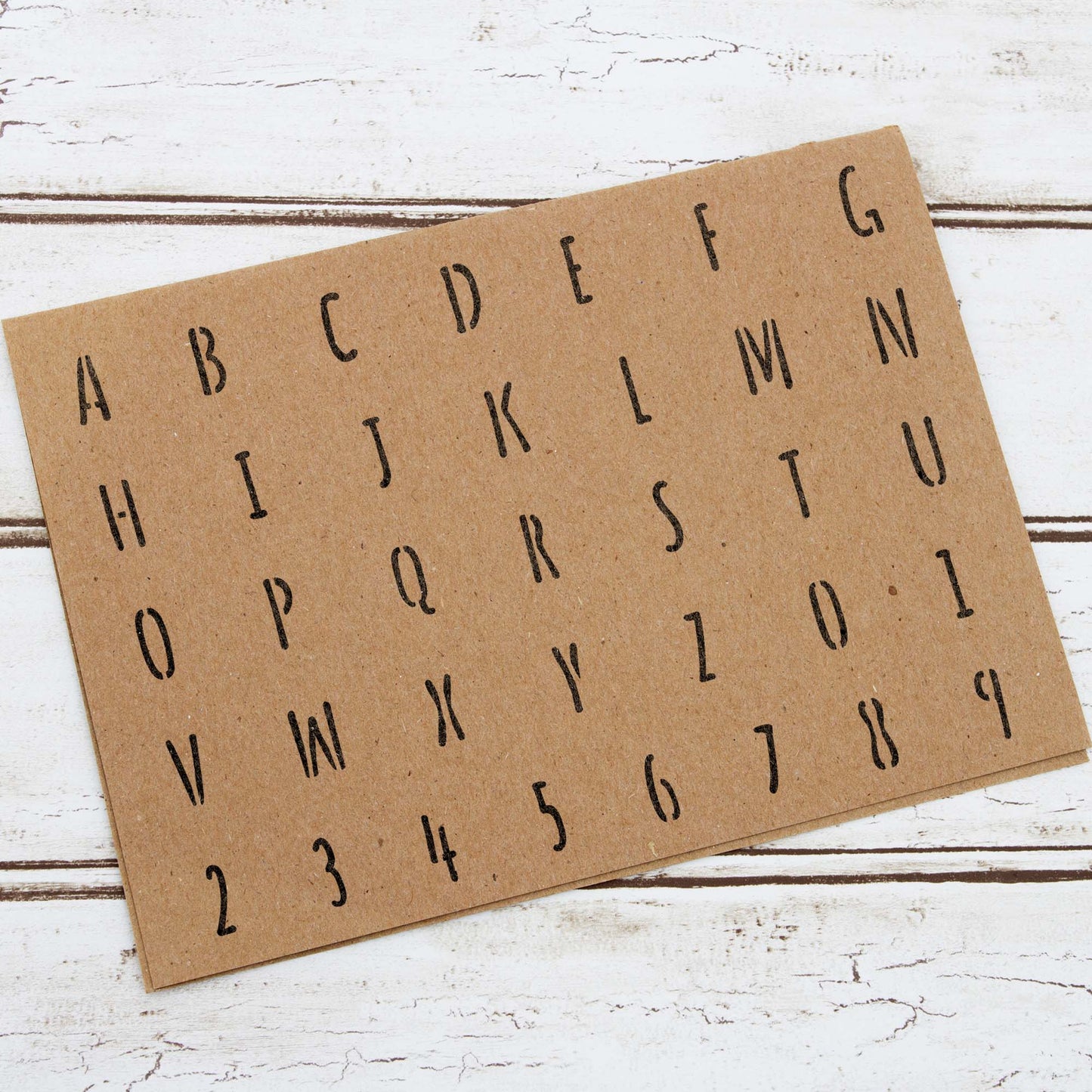 CraftStar Alphabet Stencil painted onto card