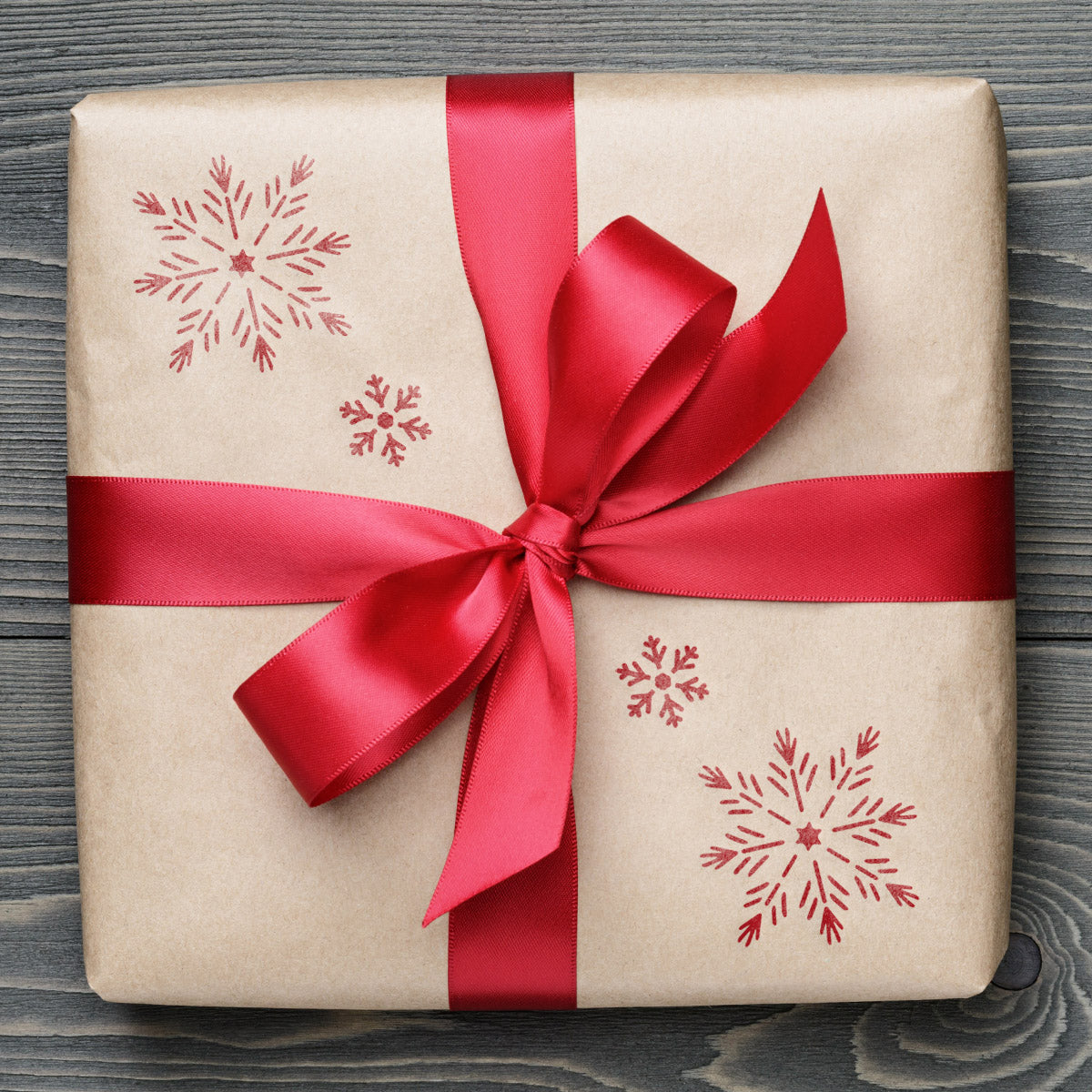 CraftStar Snowflake Stencil on Wrapping Paper