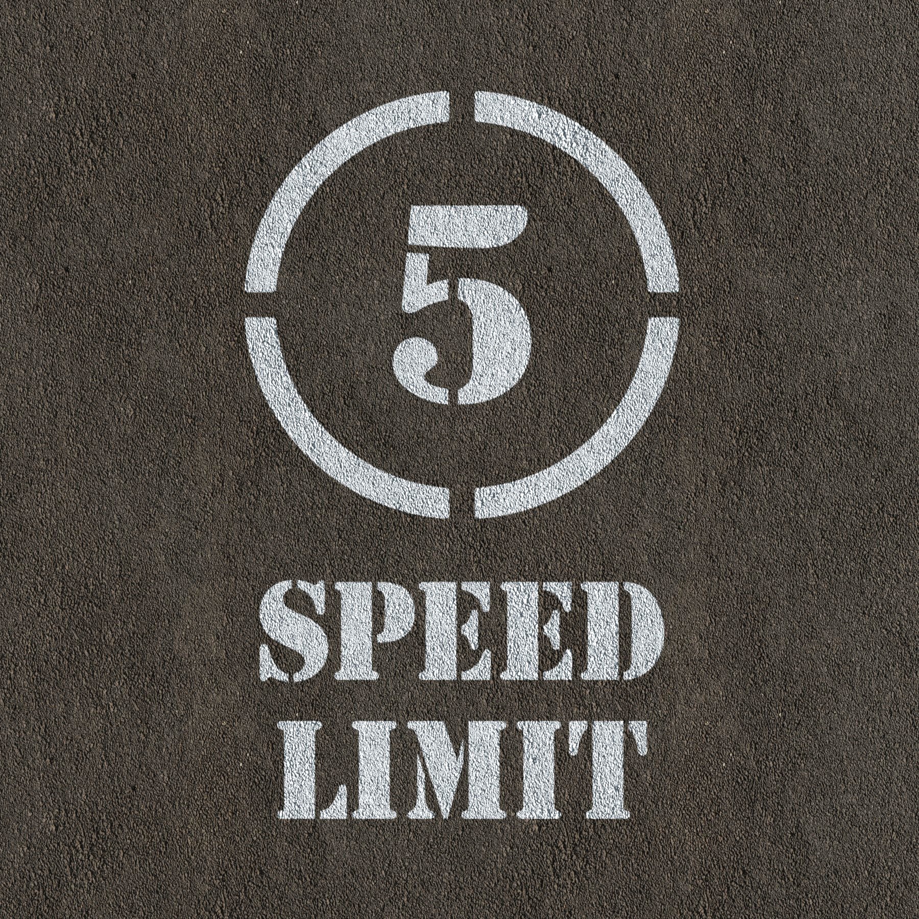 5mph Speed Limit Sign Stencil painted on road