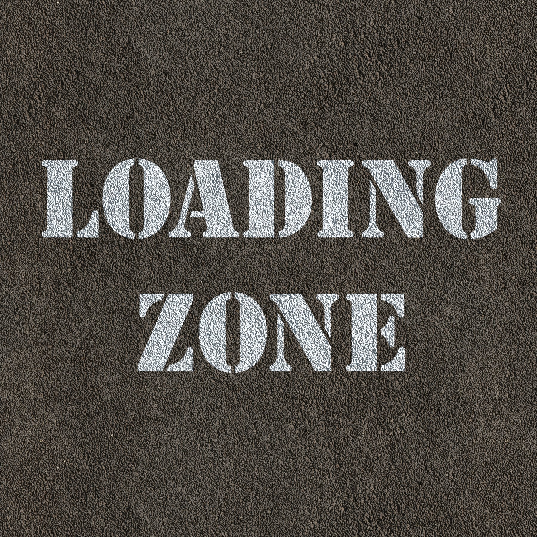 Loading Zone Stencil Spray Painted on Road Surface
