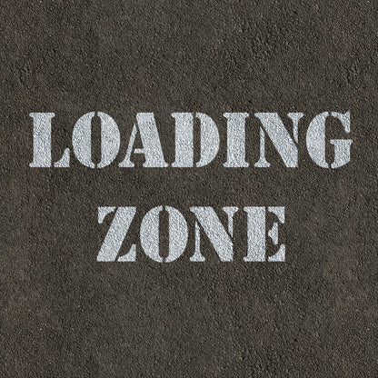 Loading Zone Stencil Spray Painted on Road Surface