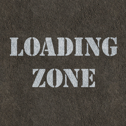 Loading Zone Stencil Spray Painted on Road Surface