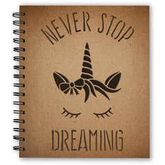 CraftStar Never Stop Dreaming Unicorn Stencil on notebook