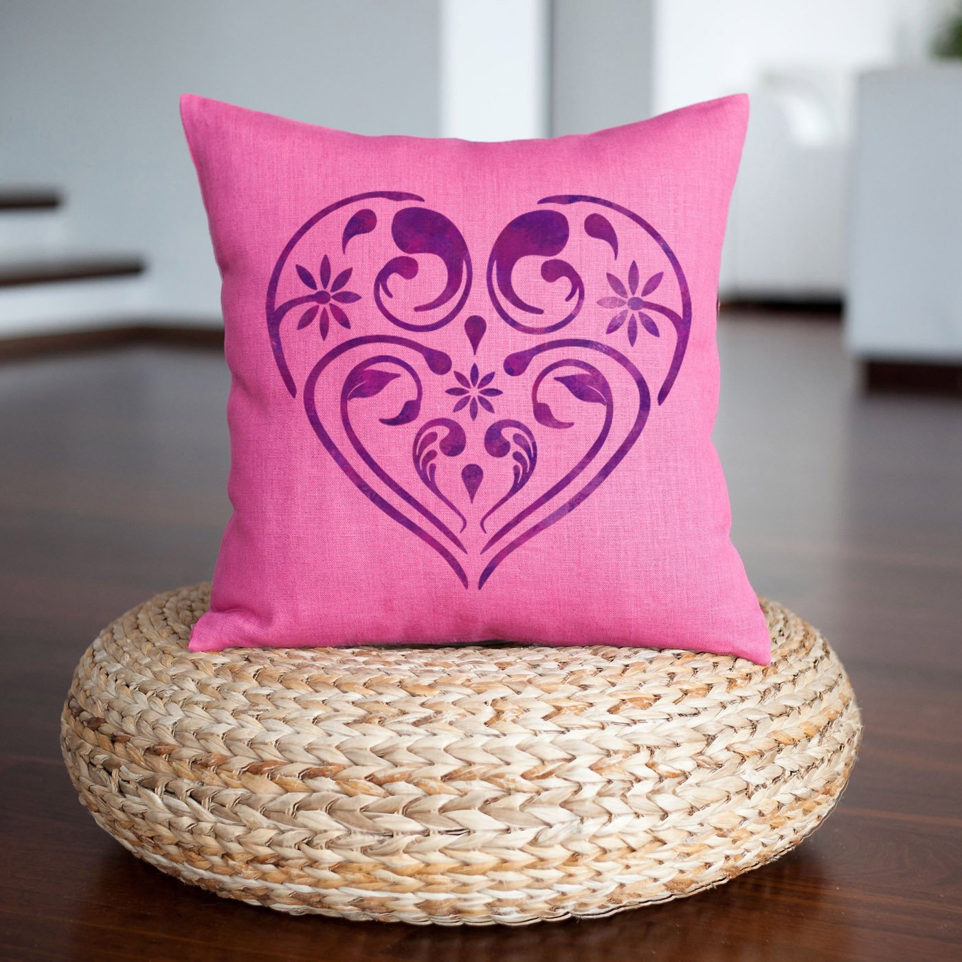 CraftStar Flourish & Flower Heart Stencil on a cushion