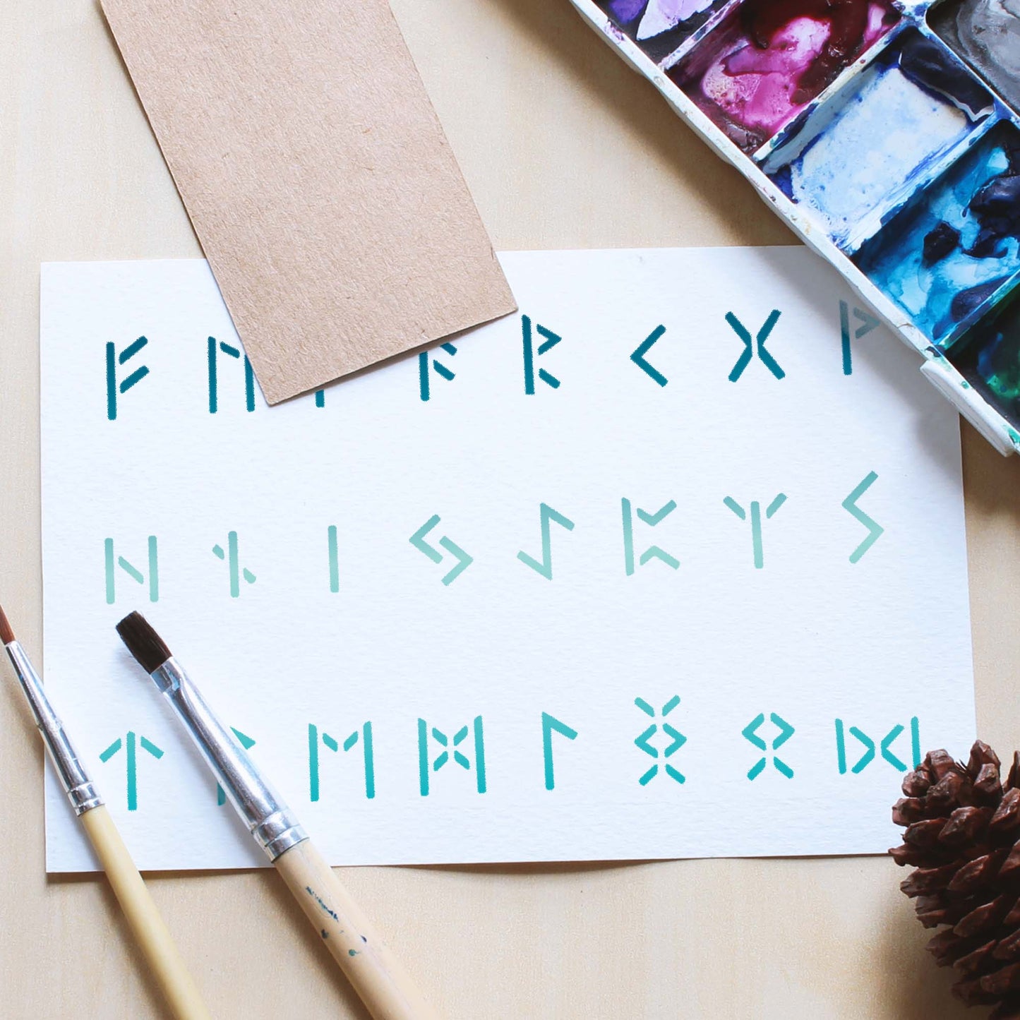 CraftStar Runic Alphabet Stencil painted on card