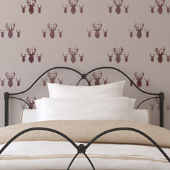 CraftStar Stag Heads Repeating Pattern Stencil over Bed